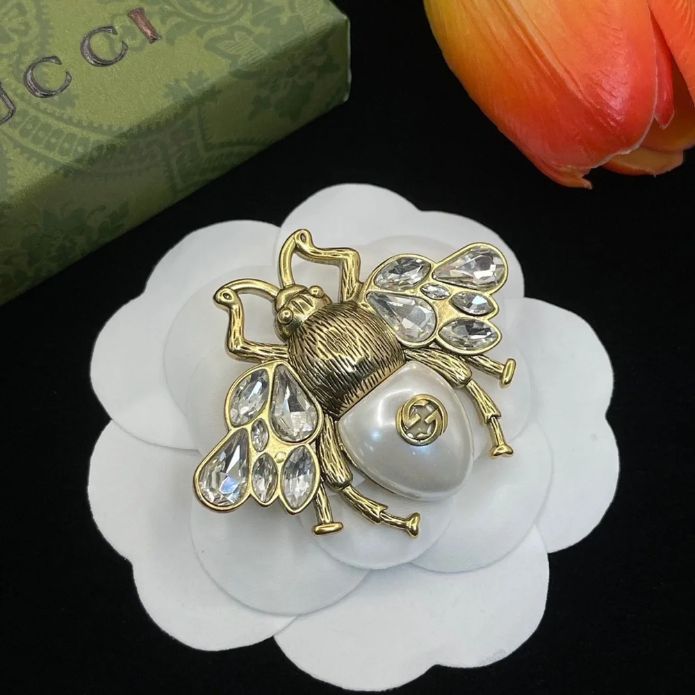 Gold-Tone Bee Brooch with Crystal Wings and Pearl Accent by Gucci
